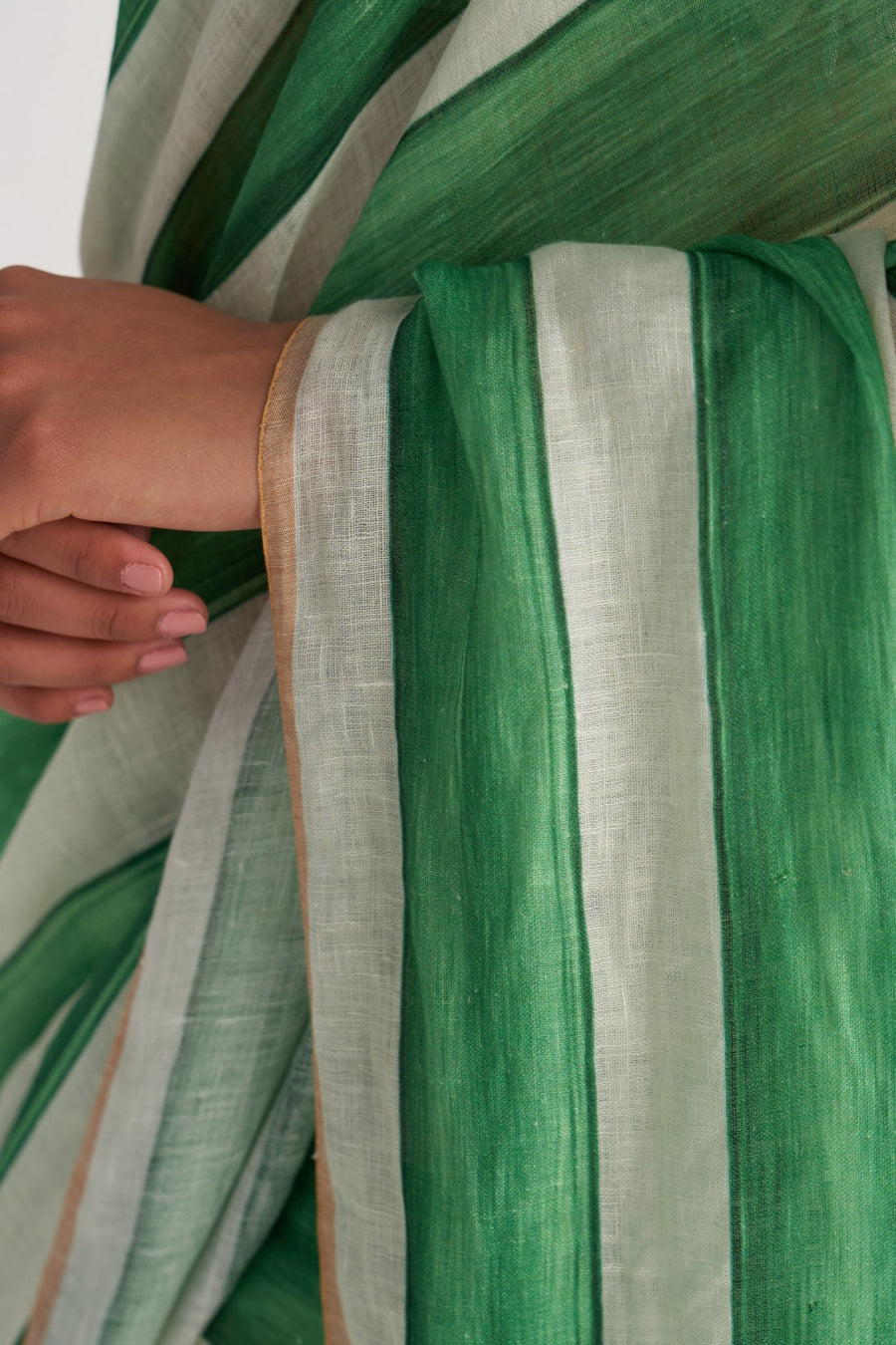 Emerald green and ivory striped linen saree - back view