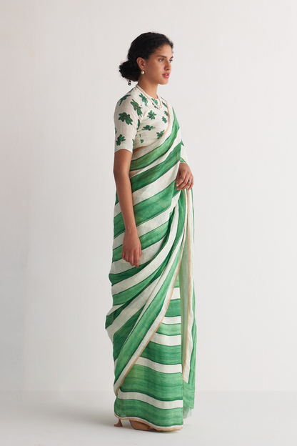 Emerald green and ivory striped linen saree - side view