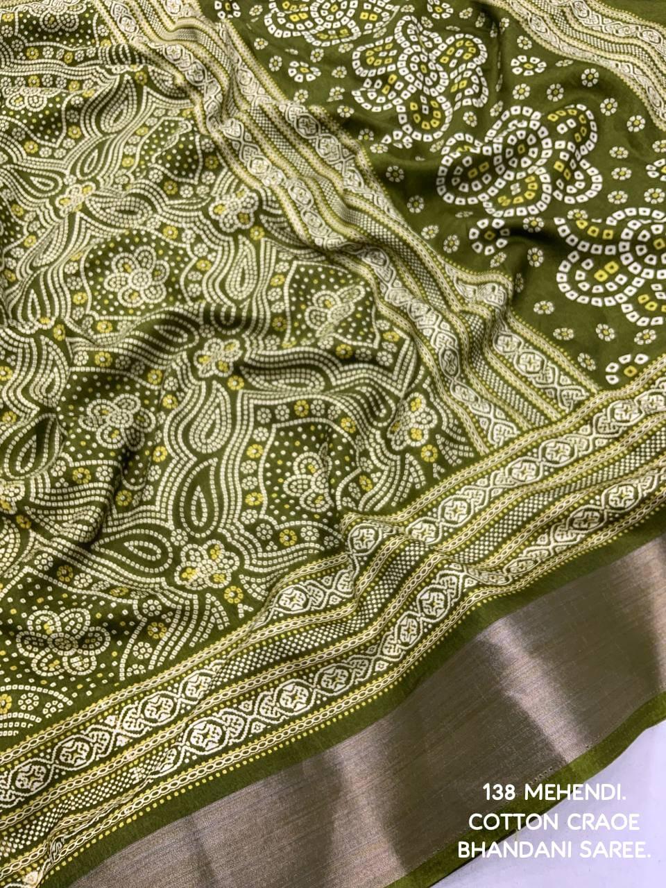 soft cotton crape Saree with bandhni prints and jaripattu woven border