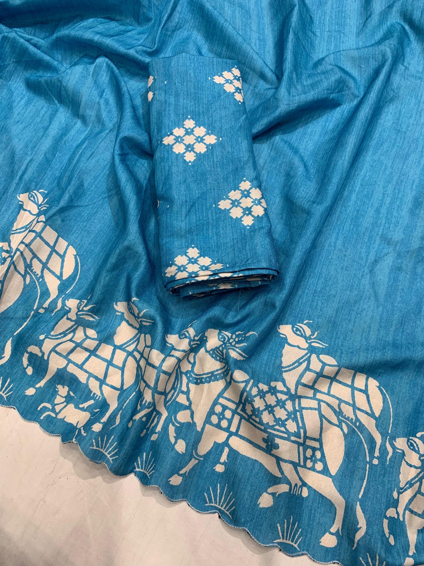 Tussar silk saree with cutwork and ikkat printed blouse