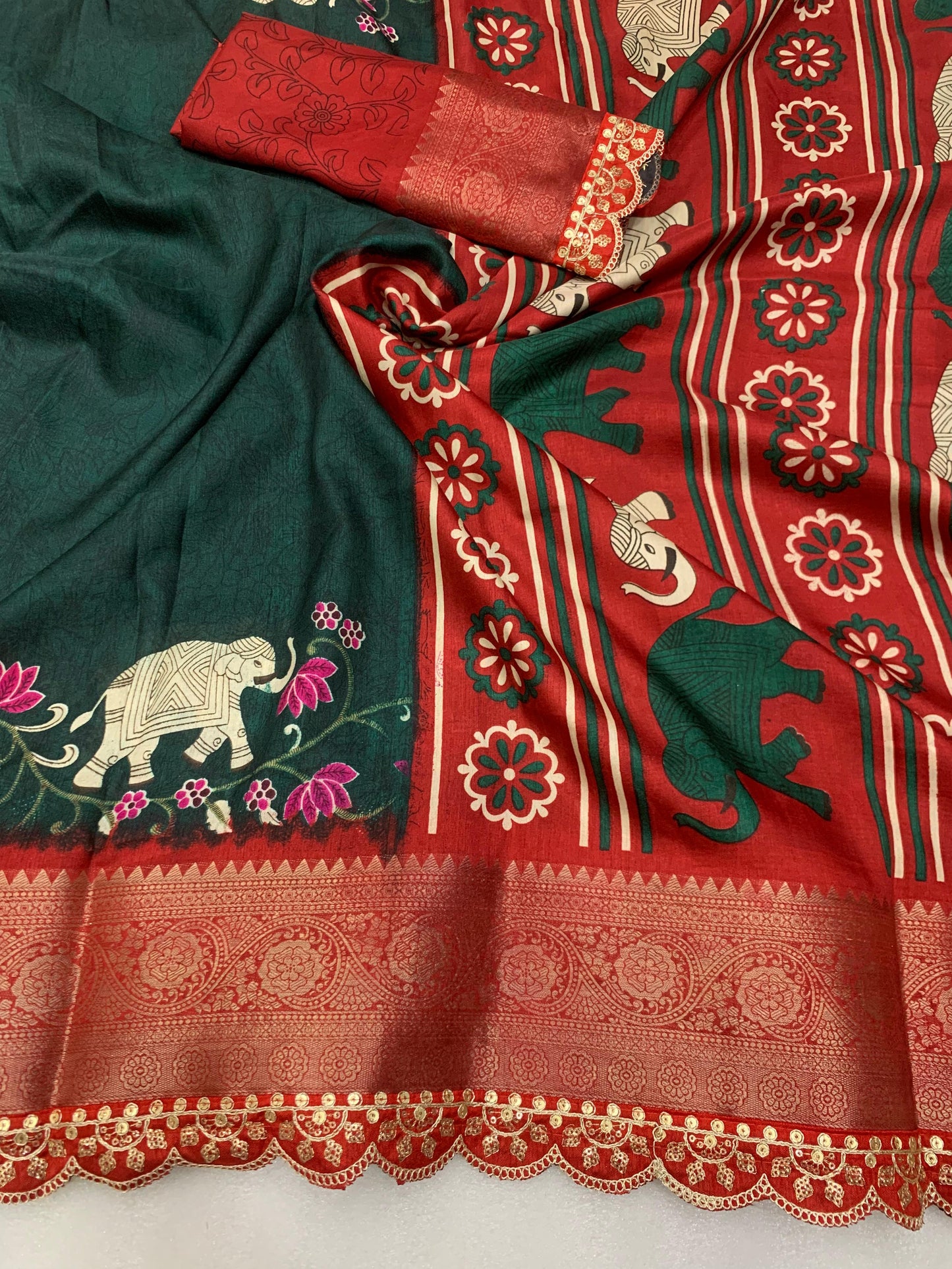 Beautiful Benny crape saree with all over kalamkari design along with scallop maggam work lace at border