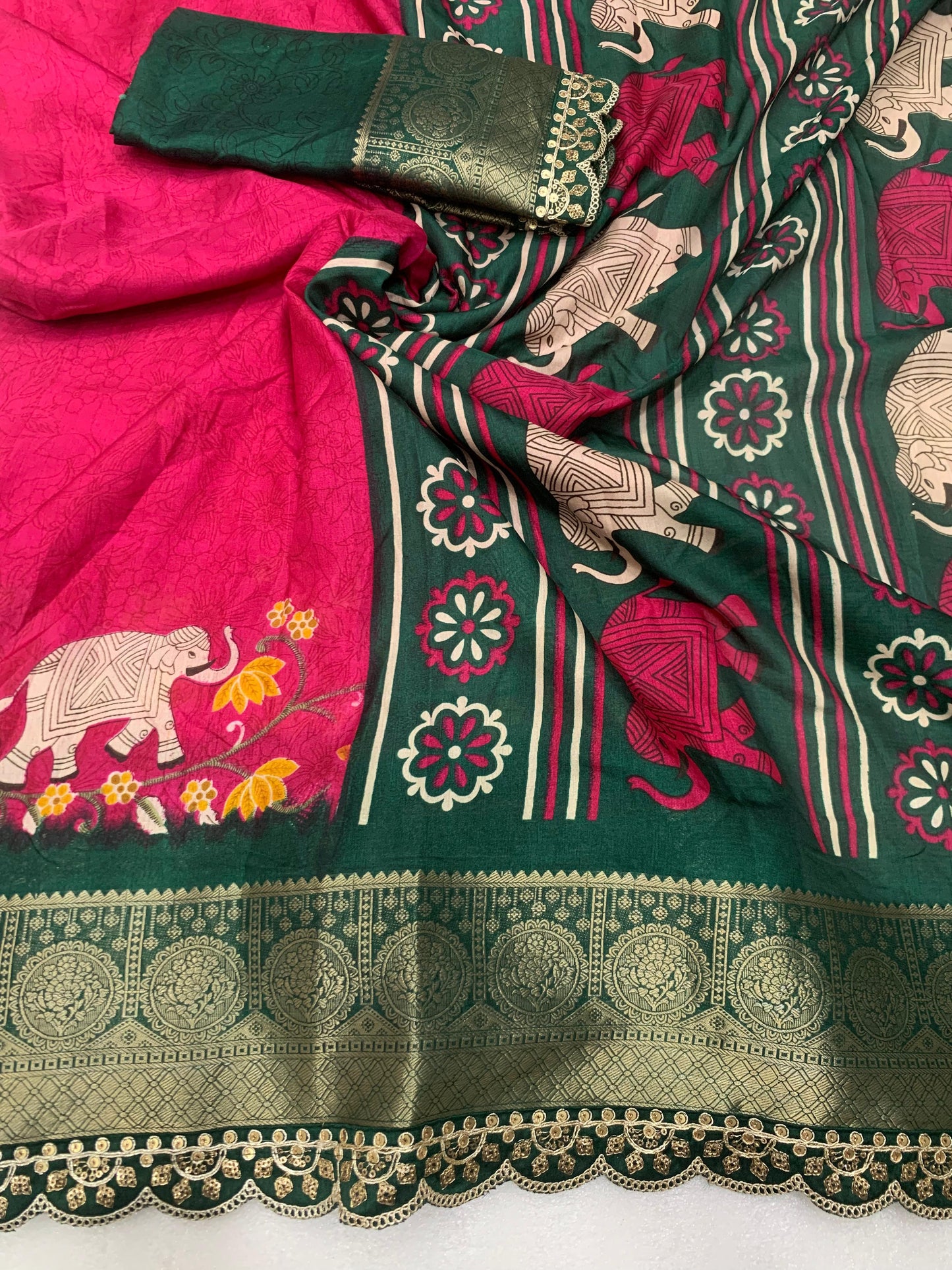 Beautiful Benny crape saree with all over kalamkari design along with scallop maggam work lace at border