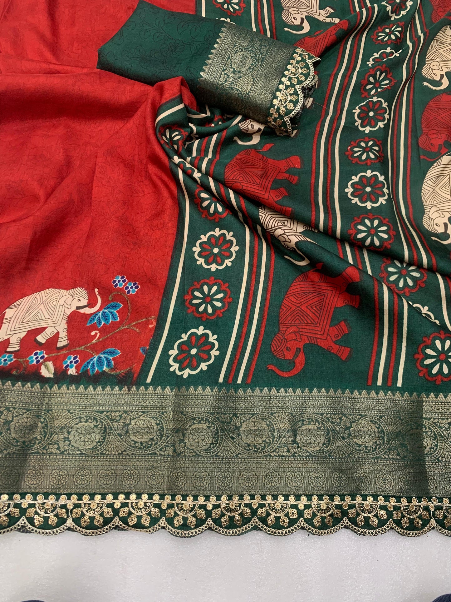 Beautiful Benny crape saree with all over kalamkari design along with scallop maggam work lace at border