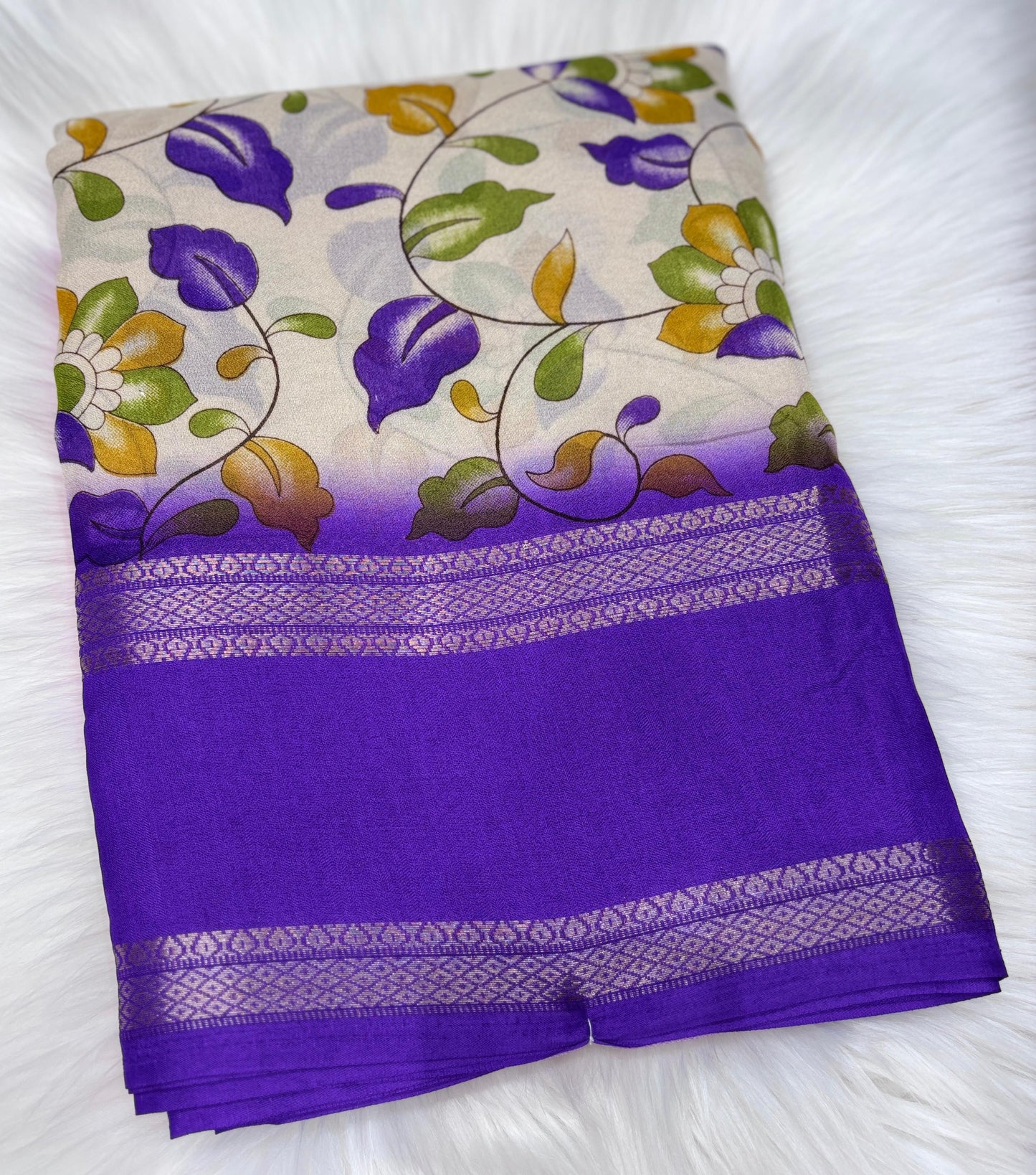 Soft Georgette saree with beautiful floral prints and heavy zari bentex border.