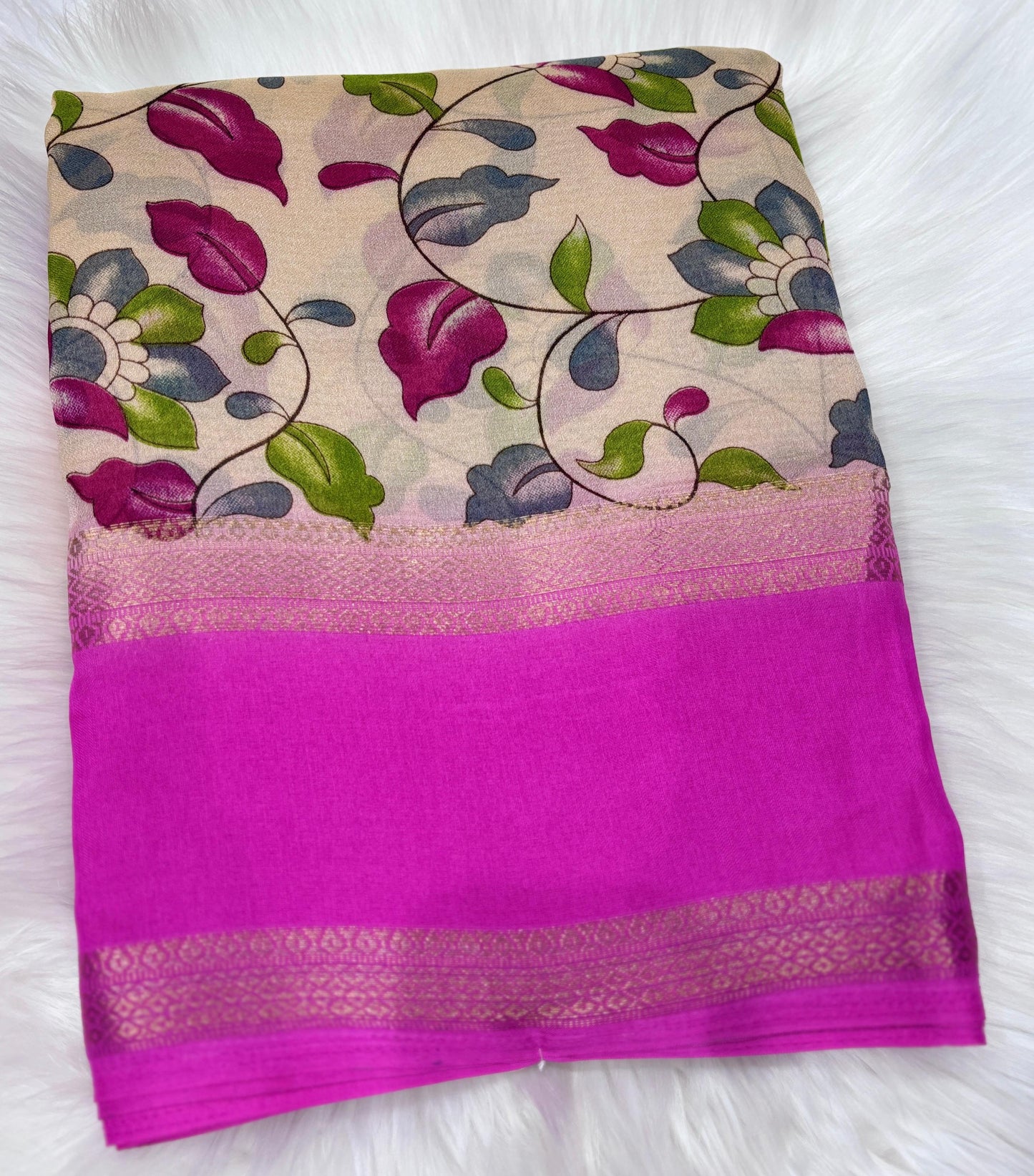 Soft Georgette saree with beautiful floral prints and heavy zari bentex border.