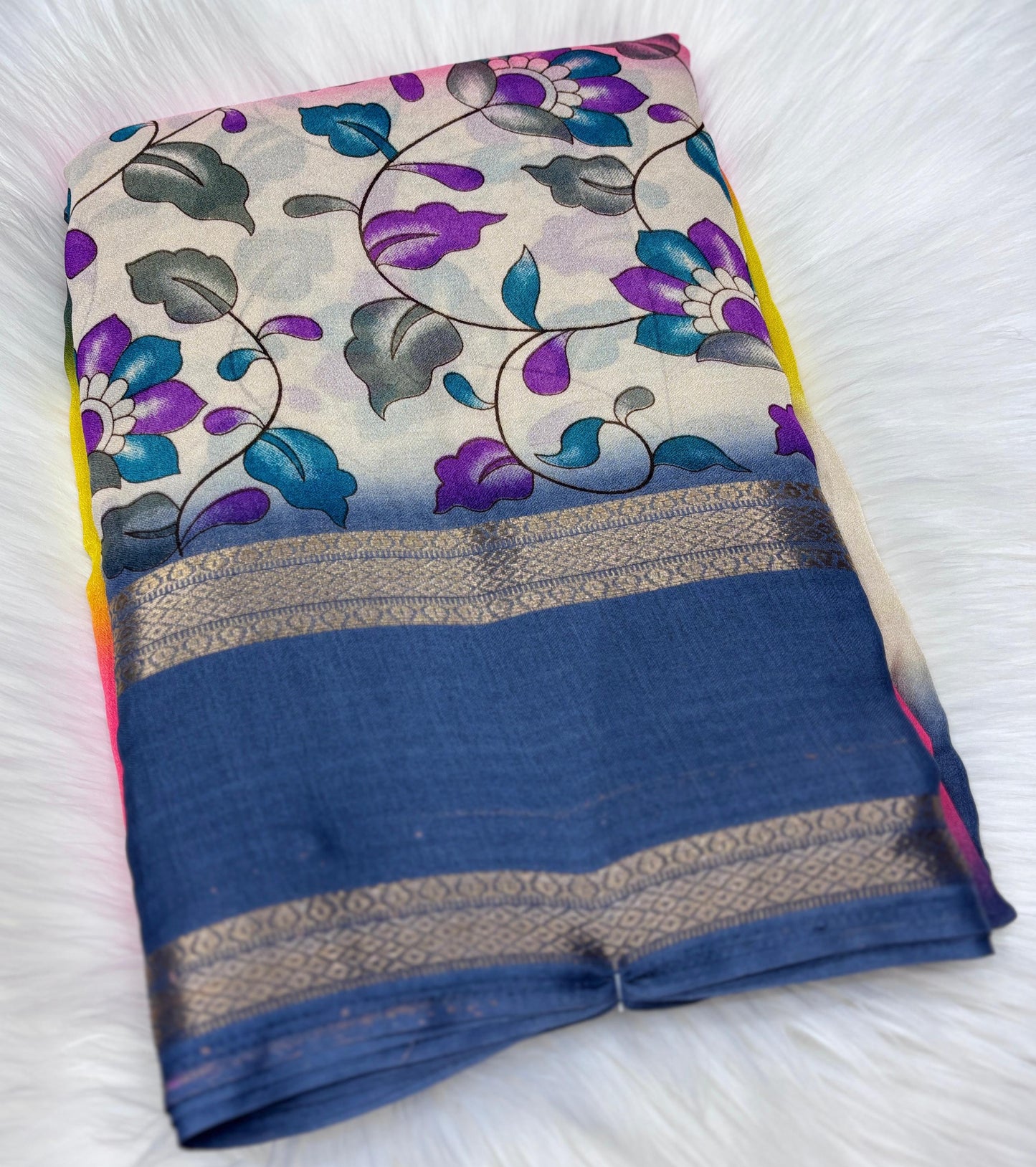 Soft Georgette saree with beautiful floral prints and heavy zari bentex border.