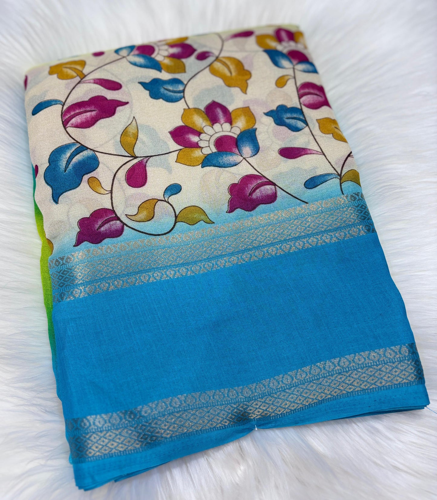 Soft Georgette saree with beautiful floral prints and heavy zari bentex border.