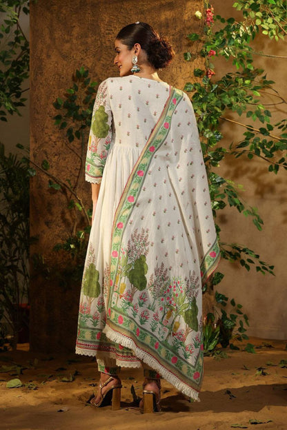 Featuring beautiful MUSLIN ALIA CUT Suit Set which is beautifully decorated with intricate hand embroidery, Zari weaving and prints. It is paired with matching pants and lace dupatta | White - Swaraas