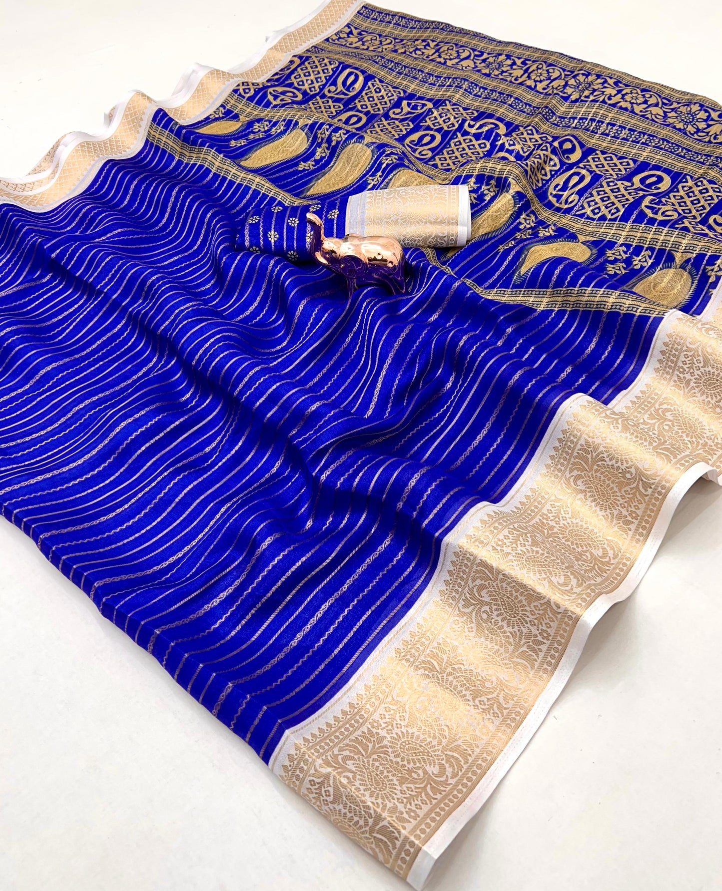 Premium Georgette All Over Weaving Saree with Rich Jacquard Border & Batik Print Blouse
