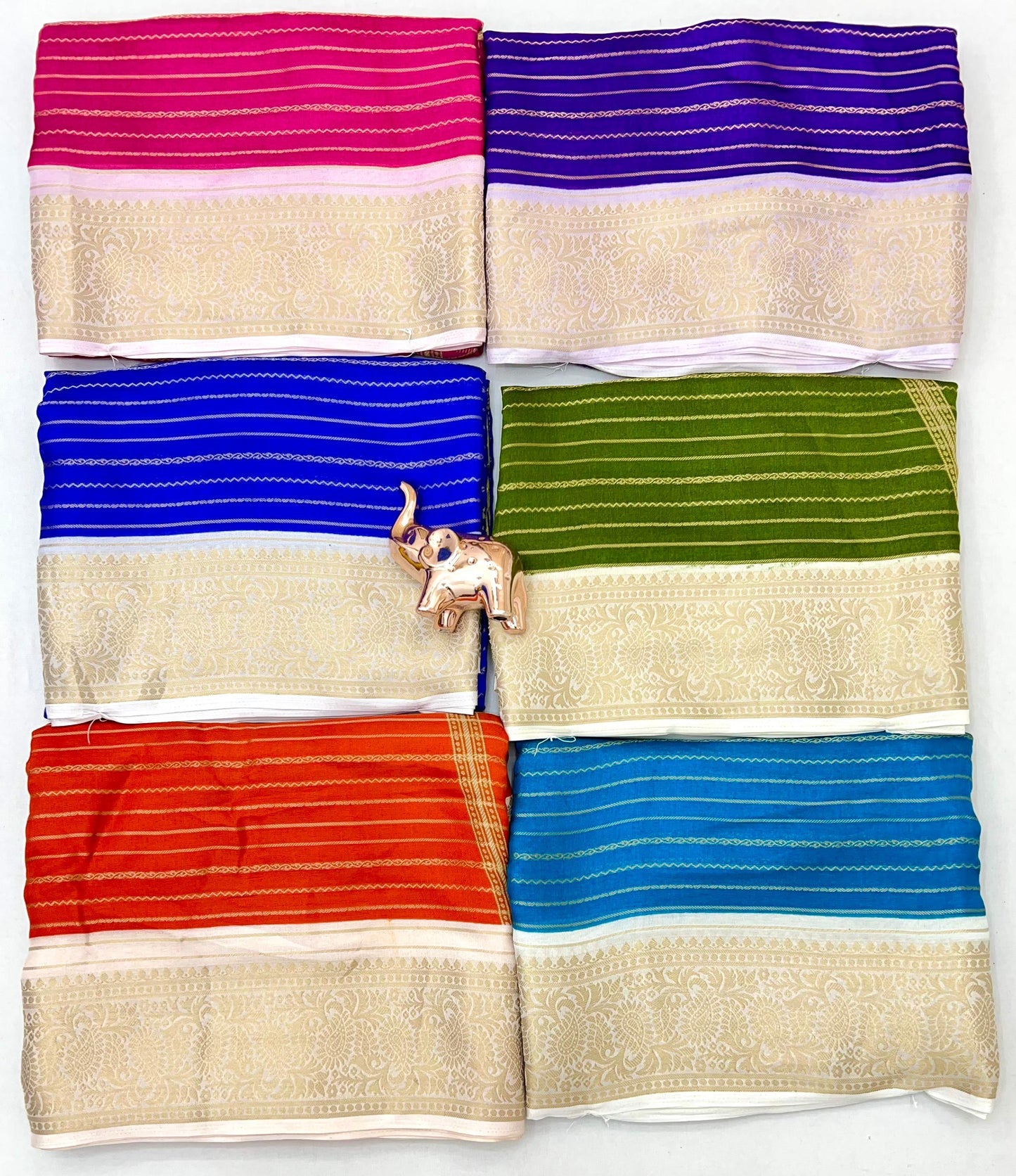 Premium Georgette All Over Weaving Saree with Rich Jacquard Border & Batik Print Blouse