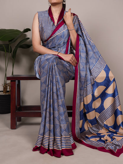 Crafted in soft dull silk with statement fancy prints, this saree blends classic charm with a modern touch 🌸