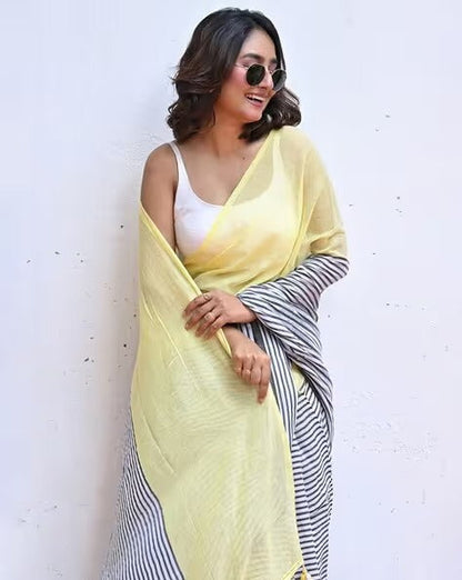 Model wearing Lemon Yellow and Navy Blue Stripe Linen Saree by Swaraas - drape detail