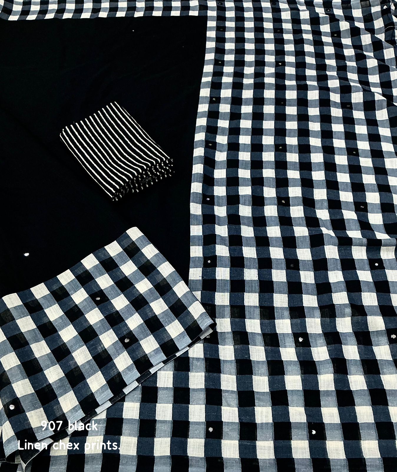 Black linen saree flat lay - full spread