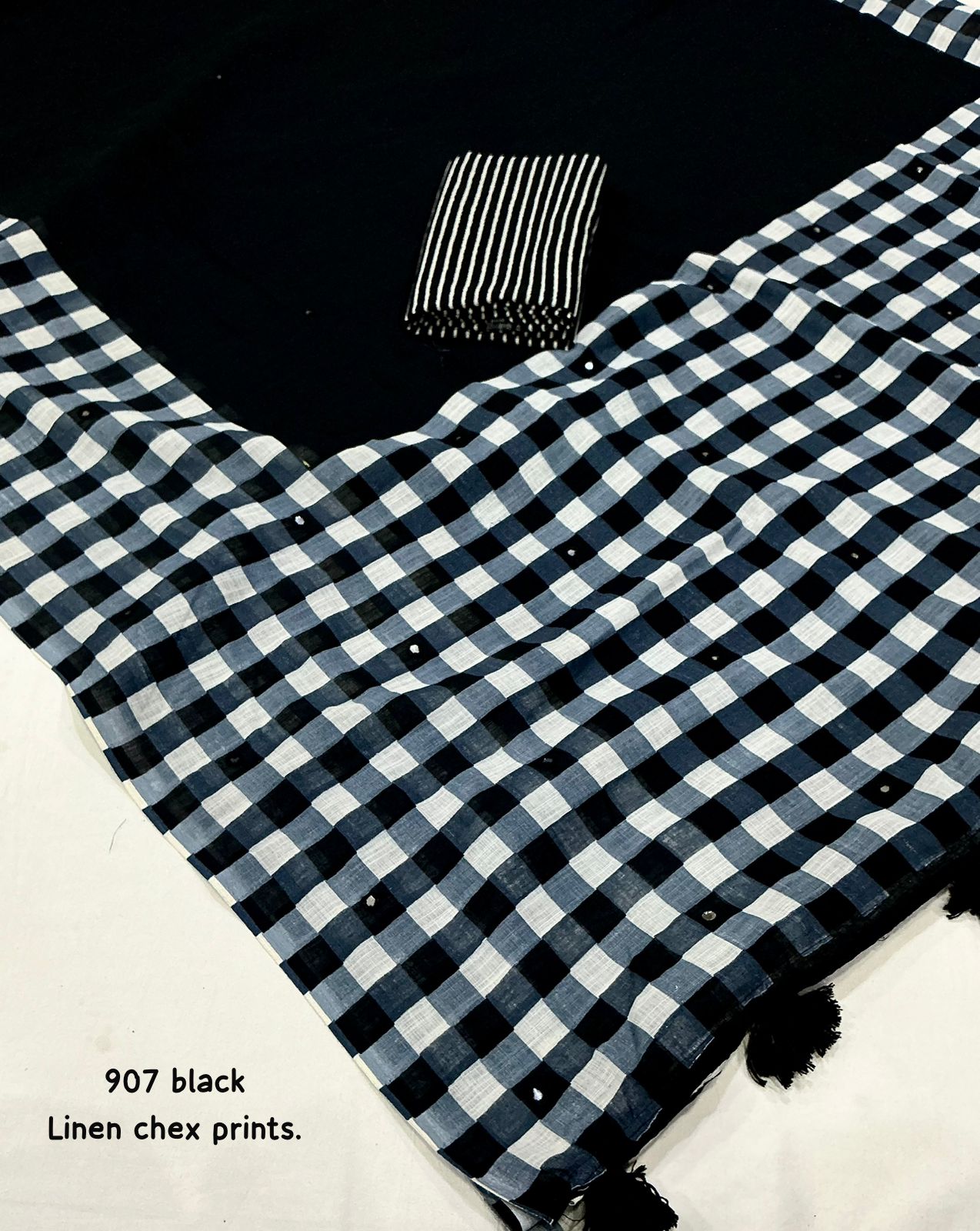 Black linen saree flat lay - blouse piece