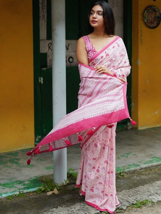 Baby pink linen saree with tassel border - full length view